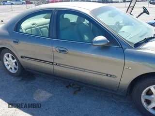 2002 Mercury Sable LS Premium with VIN 1MEFM55S52G600432, listed as a IAAI auction lot 41724753 with 139,184 mi miles and . Bid and sale history available at DreamBid. Image 6.