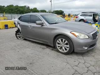 2013 Infiniti M with VIN JN1BY1AR2DM601965, listed as a Copart auction lot 62014215 with 134,047 mi miles and Salvage title. Bid and sale history available at DreamBid. Image 4.