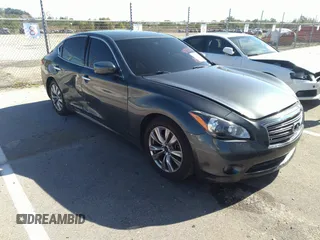 2011 Infiniti M37 with VIN JN1BY1AP4BM321931, listed as a IAAI auction lot 40914347 with 115,041 mi miles. Bid and sale history available at carsss.com. Image 1.