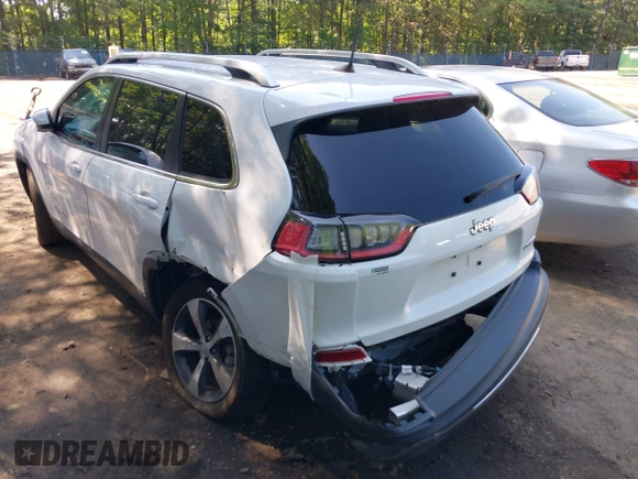 2020 Jeep Cherokee Limited with VIN 1C4PJLDBXLD652811, listed as a IAAI auction lot 42536594 with 93,785 mi miles and . Bid and sale history available at DreamBid. Image 3.