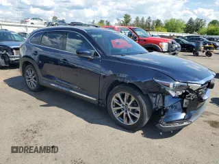 2017 Mazda CX-9 Grand Touring z VIN JM3TCBDY8H0131941, wystawiony jako Copart lot #56199685 z przebiegiem 166 080 mil mil oraz Szkoda całkowita • Salvage title. Historia ofert i sprzedaży dostępna na DreamBid. Obrazek 4.