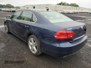 2014 Volkswagen Passat SE with VIN 1VWBP7A30EC008267, listed as a Copart auction lot 60261435 with 93,306 mi miles and Salvage title. Bid and sale history available at DreamBid. Image 2.