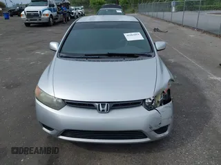 2007 Honda Civic Cpe LX with VIN 2HGFG12667H577166, listed as a IAAI auction lot 41983064 with 98,553 mi miles. Bid and sale history available at carsss.com. Image 12.