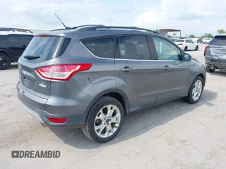 2013 Ford Escape SE with VIN 1FMCU0GXXDUD85470, listed as a IAAI auction lot 42142774 with 145,391 mi miles. Bid and sale history available at carsss.com. Image 4.