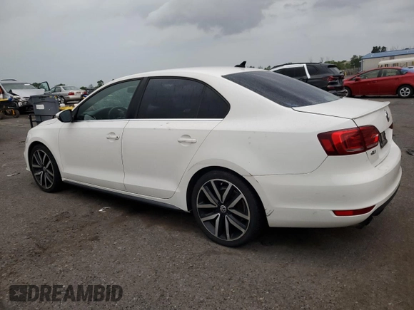 2014 Volkswagen Jetta GLI with VIN 3VW4T7AJ4EM384679, listed as a Copart auction lot 64014195 with 137,793 mi miles and Clean title. Bid and sale history available at DreamBid. Image 2.