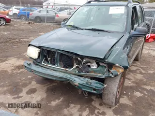2002 Chevrolet Tracker z VIN 2CNBJ13C126946857, wystawiony jako IAAI lot #41491975 z przebiegiem Nie podano mil oraz . Historia ofert i sprzedaży dostępna na DreamBid. Obrazek 6.