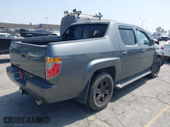 2007 Honda Ridgeline RTL with VIN 2HJYK16547H502601, listed as a IAAI auction lot 42484634 with 197,253 mi miles and . Bid and sale history available at DreamBid. Image 4.