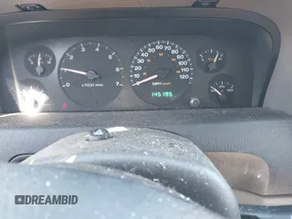 2002 Jeep Grand Cherokee z VIN 1J4GX38S92C149908, wystawiony jako IAAI lot #41782530 z przebiegiem 145 195 mil mil oraz . Historia ofert i sprzedaży dostępna na DreamBid. Obrazek 7.