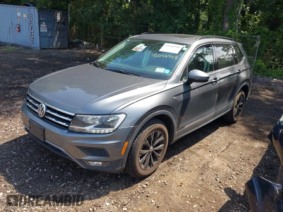 2018 Volkswagen Tiguan SEL with VIN 3VV2B7AXXJM020392, listed as a IAAI auction lot 42646948 with 58,685 mi miles and . Bid and sale history available at DreamBid. Image 2.