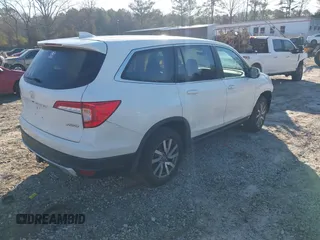 2021 Honda Pilot EX-L with VIN 5FNYF6H52MB062365, listed as a IAAI auction lot 41664771 with 42,393 mi miles. Bid and sale history available at carsss.com. Image 4.