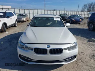 2016 BMW 3 Series 328i with VIN WBA8E9C57GK603555, listed as a IAAI auction lot 41684276 with 113,060 mi miles and . Bid and sale history available at DreamBid. Image 12.