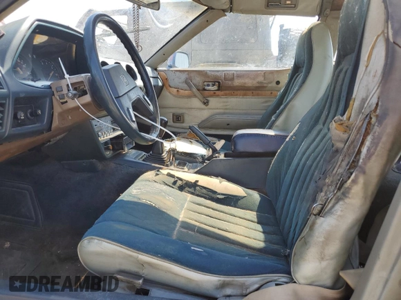 1981 Datsun 280ZX z VIN JN1HZ04S2BX268405, wystawiony jako Copart lot #65626714 z przebiegiem 94 507 mil mil oraz Tytuł czysty. Historia ofert i sprzedaży dostępna na DreamBid. Obrazek 7.