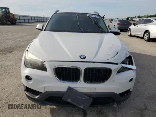 2015 BMW X1 sDrive28i with VIN WBAVM1C58FVZ93621, listed as a Copart auction lot 49897325 with 72,884 mi miles and Salvage Title. Bid and sale history available at carsss.com. Image 5.