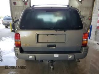 1998 Jeep Grand Cherokee Limited with VIN 1J4GZ78Y8WC285670, listed as a Copart auction lot 70213044 with 128,382 mi miles and Clean Title. Bid and sale history available at carsss.com. Image 6.