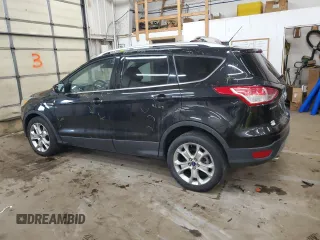 2015 Ford Escape Titanium with VIN 1FMCU9JX9FUA30970, listed as a Copart auction lot 41780275 with 106,114 mi miles and Salvage Title. Bid and sale history available at DreamBid. Image 2.