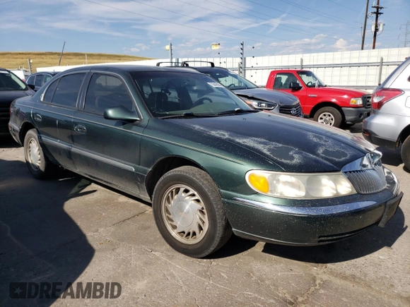 1998 Lincoln Continental with VIN 1LNFM97V8WY707809, listed as a Copart auction lot 70842654 with 175,066 mi miles and Salvage Title. Bid and sale history available at carsss.com. Image 4.