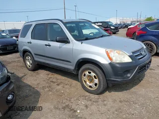 2005 Honda CR-V LX z VIN SHSRD78565U332594, wystawiony jako IAAI lot #42408771 z przebiegiem 220 919 mil mil oraz . Historia ofert i sprzedaży dostępna na DreamBid. Obrazek 1.