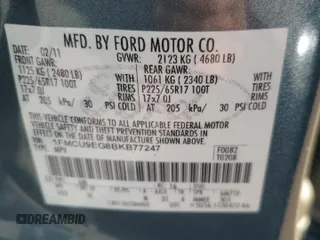2011 Ford Escape Limited with VIN 1FMCU9EG8BKB77247, listed as a Copart auction lot 53681885 with 145,945 mi miles and Salvage Title. Bid and sale history available at DreamBid. Image 14.