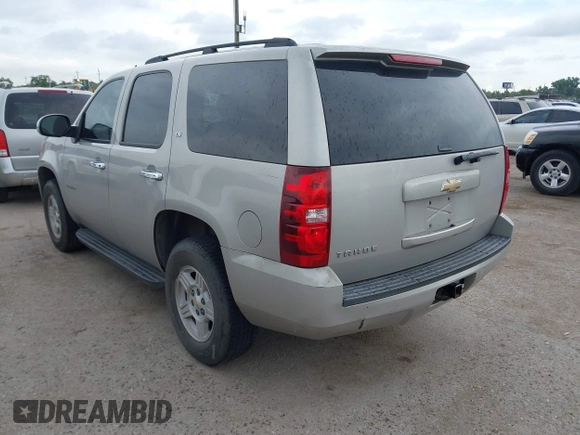 2007 Chevrolet Tahoe LS with VIN 1GNFC13C57R417897, listed as a IAAI auction lot 42588952 with 212,919 mi miles and . Bid and sale history available at DreamBid. Image 3.