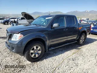 2012 Nissan Frontier Pro-4X z VIN 1N6AD0EV0CN700182, wystawiony jako Copart lot #57844755 z przebiegiem 127 869 mil mil oraz Szkoda całkowita • Salvage title. Historia ofert i sprzedaży dostępna na DreamBid. Obrazek 1.