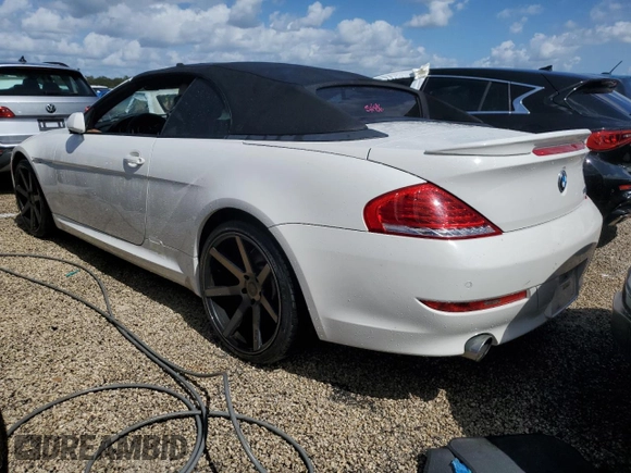 2009 BMW 6 Series 650i with VIN WBAEB53589CX64448, listed as a Copart auction lot 73867784 with 80,795 mi miles and Salvage Title. Bid and sale history available at carsss.com. Image 2.