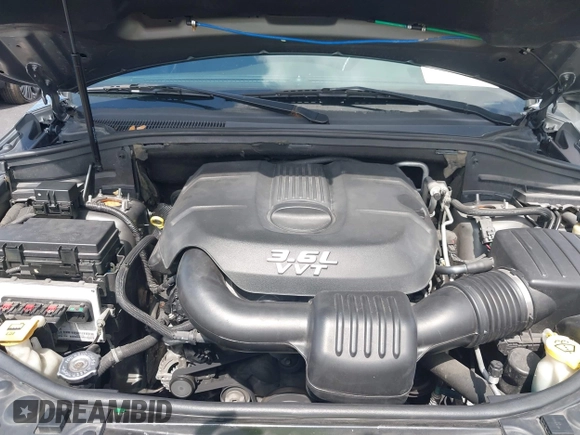 2013 Dodge Durango SXT with VIN 1C4RDHAGXDC500144, listed as a IAAI auction lot 42693122 with 194,519 mi miles and . Bid and sale history available at DreamBid. Image 10.