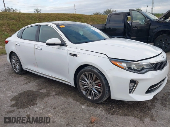 2018 Kia Optima SX with VIN 5XXGV4L21JG182103, listed as a IAAI auction lot 40522762 with 60,542 mi miles and . Bid and sale history available at DreamBid. Image 1.