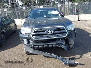 2017 Toyota Tacoma SR5 with VIN 5TFAZ5CN3HX040199, listed as a IAAI auction lot 41734051 with 107,665 mi miles and . Bid and sale history available at carsss.com. Image 11.