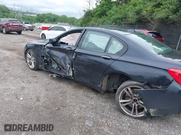 2011 BMW 7 Series 750i xDrive with VIN WBAKC6C57BC394301, listed as a IAAI auction lot 42460658 with 118,600 mi miles and . Bid and sale history available at DreamBid. Image 3.