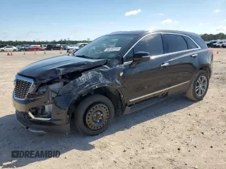 2021 Cadillac XT5 FWD Premium Luxury z VIN 1GYKNCRS1MZ107036, wystawiony jako Copart lot #56702175 z przebiegiem 66 813 mil mil oraz Szkoda całkowita • Salvage title. Historia ofert i sprzedaży dostępna na DreamBid. Obrazek 1.