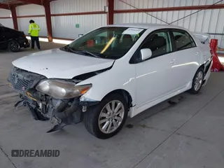 2009 Toyota Corolla with VIN 1NXBU40EX9Z105775, listed as a IAAI auction lot 42054152 with 147,272 mi miles. Bid and sale history available at carsss.com. Image 2.
