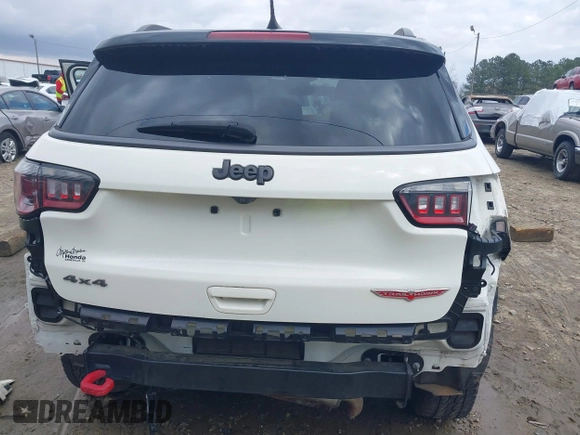 2019 Jeep Compass Trailhawk with VIN 3C4NJDDB0KT733175, listed as a IAAI auction lot 41724527 with 82,574 mi miles and . Bid and sale history available at carsss.com. Image 6.