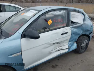 2007 Hyundai Accent GS with VIN KMHCM36CX7U006584, listed as a IAAI auction lot 41801452 with 1 mi miles. Bid and sale history available at carsss.com. Image 6.