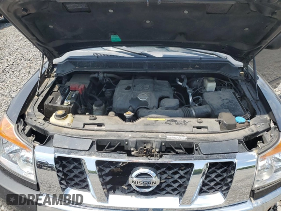 2012 Nissan Titan SV z VIN 1N6AA0EJ9CN325608, wystawiony jako Copart lot #58925565 z przebiegiem 86 967 mil mil oraz Szkoda całkowita • Salvage title. Historia ofert i sprzedaży dostępna na DreamBid. Obrazek 11.