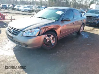 2004 Nissan Altima S with VIN 1N4AL11D24C102557, listed as a IAAI auction lot 41663563 with 151,144 mi miles. Bid and sale history available at carsss.com. Image 17.