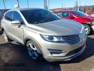 2015 Lincoln MKC with VIN 5LMCJ1A91FUJ32885, listed as a IAAI auction lot 41409144 with 103,073 mi miles. Bid and sale history available at carsss.com. Image 1.