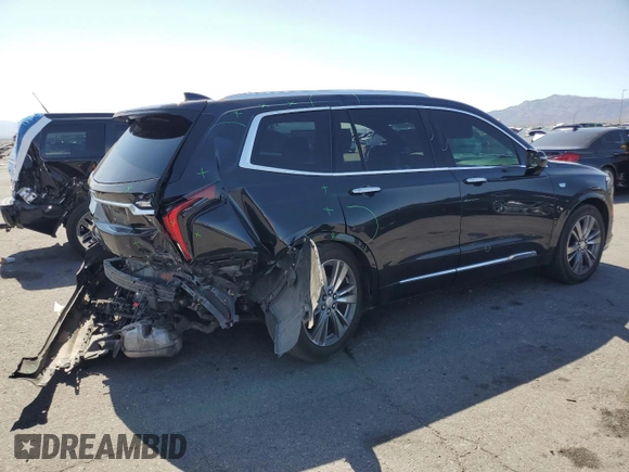 2020 Cadillac XT6 FWD Premium Luxury z VIN 1GYKPCRS9LZ126510, wystawiony jako Copart lot #58240585 z przebiegiem 57 156 mil mil oraz Szkoda całkowita • Salvage title. Historia ofert i sprzedaży dostępna na DreamBid. Obrazek 3.