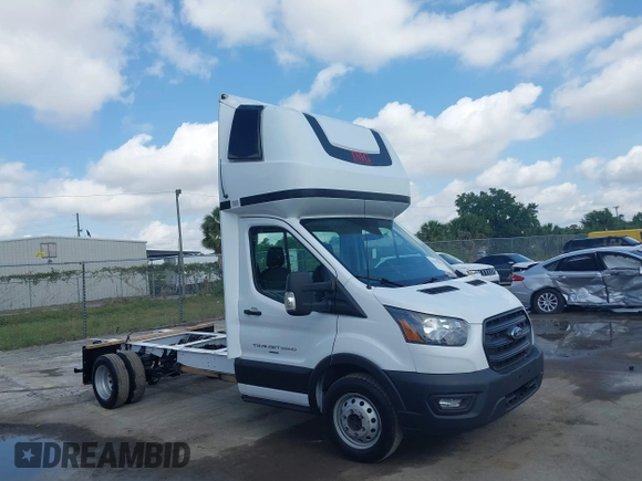 2023 Ford Transit z VIN 1FDBF6ZG0PKB35192, wystawiony jako IAAI lot #42191303 z przebiegiem 207 810 mil mil oraz . Historia ofert i sprzedaży dostępna na DreamBid. Obrazek 1.