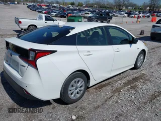 2022 Toyota Prius L Eco with VIN JTDKAMFUXN3159170, listed as a IAAI auction lot 41930288 with 53,414 mi miles and . Bid and sale history available at DreamBid. Image 4.