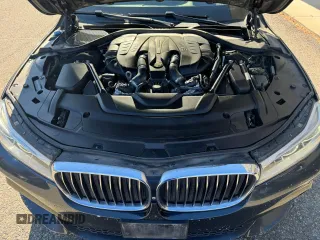 2016 BMW 7 Series 750i with VIN WBA7F0C53GGM20435, listed as a Copart auction lot 77656554 with 186,227 mi miles and Clean Title. Bid and sale history available at carsss.com. Image 7.