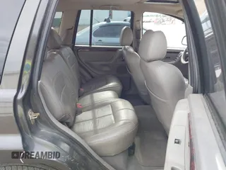 2004 Jeep Grand Cherokee Limited with VIN 1J4GW58N54C372118, listed as a IAAI auction lot 42526424 with 187,430 mi miles and . Bid and sale history available at DreamBid. Image 8.
