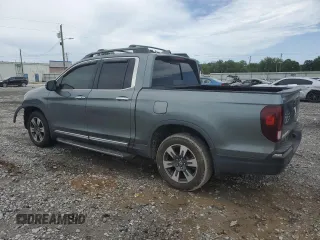 2017 Honda Ridgeline RTL-E with VIN 5FPYK3F77HB009995, listed as a Copart auction lot 59954705 with 119,381 mi miles and Salvage title. Bid and sale history available at DreamBid. Image 2.