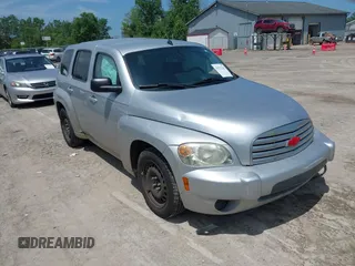 2011 Chevrolet HHR LS z VIN 3GNBAAFW1BS544002, wystawiony jako IAAI lot #42572342 z przebiegiem 146 348 mil mil oraz . Historia ofert i sprzedaży dostępna na DreamBid. Obrazek 1.