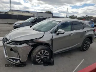 2022 Lexus RX with VIN 2T2AZMAA4NC230058, listed as a Copart auction lot 46036875 with 33,549 mi miles and Salvage Title. Bid and sale history available at carsss.com. Image 1.