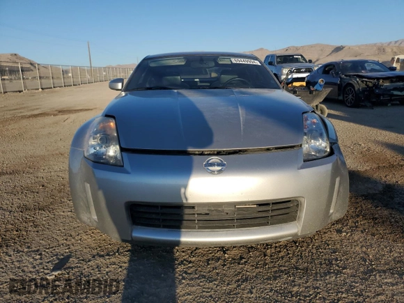 2004 Nissan 350Z Touring with VIN JN1AZ34E44T052451, listed as a Copart auction lot 69449994 with 140,524 mi miles and Salvage Title. Bid and sale history available at carsss.com. Image 5.