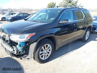 2019 Chevrolet Traverse LT Cloth with VIN 1GNEVGKW2KJ135213, listed as a IAAI auction lot 41293389 with 102,217 mi miles. Bid and sale history available at carsss.com. Image 2.