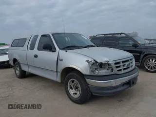1999 Ford F-150 with VIN 1FTZX1720XKA10512, listed as a IAAI auction lot 41247083 with 169,154 mi miles and . Bid and sale history available at DreamBid. Image 6.