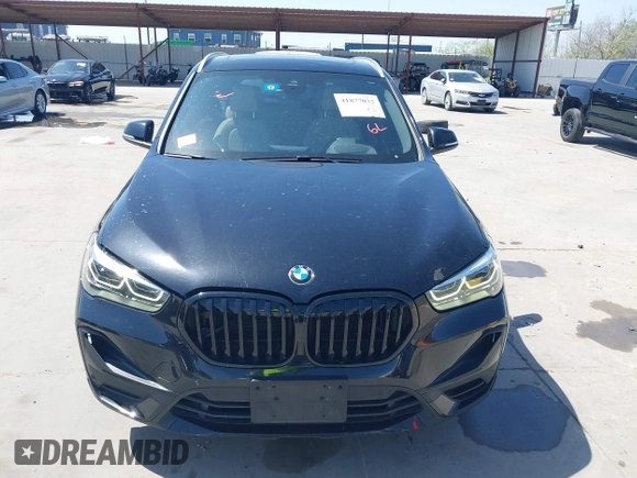 2021 BMW X1 sDrive28i with VIN WBXJG7C07M3M65841, listed as a IAAI auction lot 41877032 with 79,817 mi miles and . Bid and sale history available at DreamBid. Image 12.