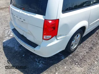 2012 Dodge Grand Caravan SXT with VIN 2C4RDGCG9CR200432, listed as a IAAI auction lot 42027477 with 99,076 mi miles and . Bid and sale history available at DreamBid. Image 6.