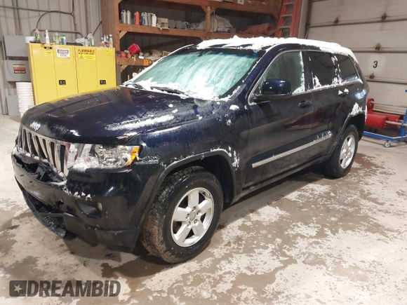 2011 Jeep Grand Cherokee Laredo with VIN 1J4RR4GG3BC640075, listed as a IAAI auction lot 41712754 with 190,199 mi miles. Bid and sale history available at carsss.com. Image 17.